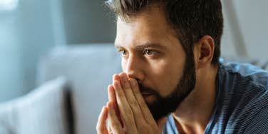 lonely man with no friends sitting alone thinking