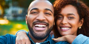 brilliant intelligent couple smiling together