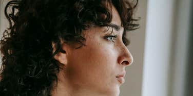 Woman's life feels overwhelming.