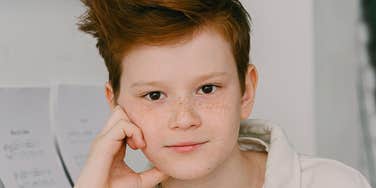 Well-regulated kid is sitting chill.