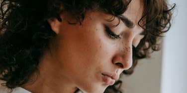 Woman feels hurt deeply, but struggles to say it.