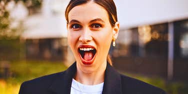 Woman with habits that make her seem less attractive than she probably is