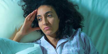 woman overthinking late at night