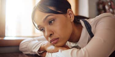 sad woman living with deep life regrets