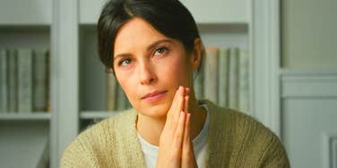 woman feeling uncomfortable during awkward interaction