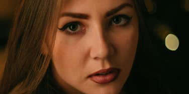 Woman realizes that relationship issues are serious.