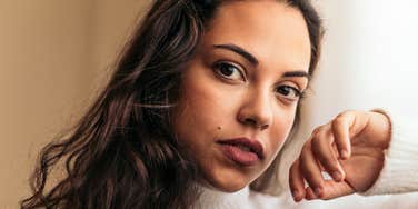 highly intelligent woman thinking deeply