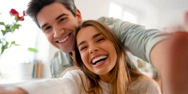 man taking selfie with wife who makes an excellent life partner