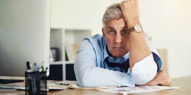 stressed employee sitting at desk