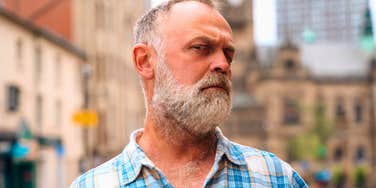 suspicious man lacking basic manners he doesn't care about