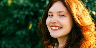 young woman with a rare soul being divinely protected by the universe