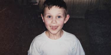 A cheerful boy in a 1980s vintage photo, representing the distinct upbringing that quietly shaped the life skills and perspective of an entire generation.