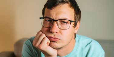 highly intelligent and deeply sensitive man feeling emotionally drained