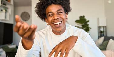 introverted man who actually knows how to socialize talking to friend