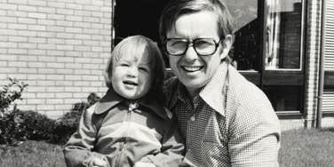 Vintage 1970s photo of a father and child together, capturing the unique childhood experiences of kids raised in the sixties and seventies