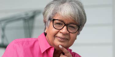 Woman stays sharp by strengthening her mental muscles.