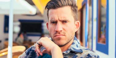 narcissistic man looking angry and plotting in his relationship