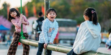 Neighborhood kids play with now parents in sight.