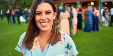 happy smiling woman leaving a party without saying goodbye