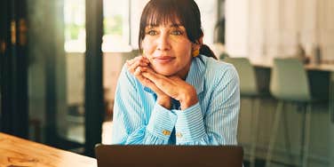 quirky woman thinking about starting a new project while working on one already