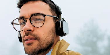 man wearing headphones listening to the same music he loved in his 20s