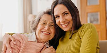 woman who was raised right hugging her mother