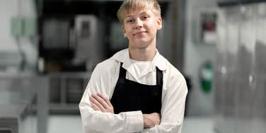 photo of teen working fast food restaurant people calling out labor laws