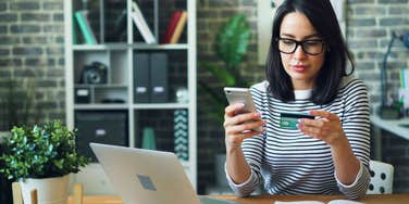 woman paying random fees