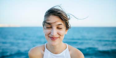 woman experiencing the benefits of blue spaces