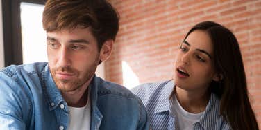 man ignoring woman who he sees as an option but not a priority