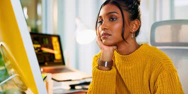 woman at work with zero life outside her job looking sad