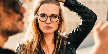 Woman revealing her true character with a sideways glance