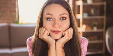 genius woman smiling while overcoming burnout