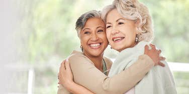 two older women hugging