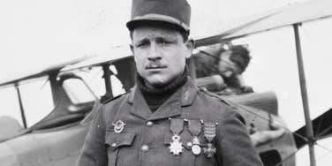 A veteran in his youth standing proudly by his plane, representing the 70-year mystery of a first love and the enduring power of wartime memories.