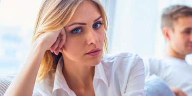 lonely and misunderstood wife turned away from husband at home