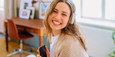 woman who prefers comfort over dressing up and being fancy relaxing at home with music