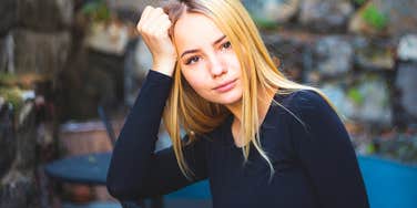 authentic woman feeling annoyed by fake people