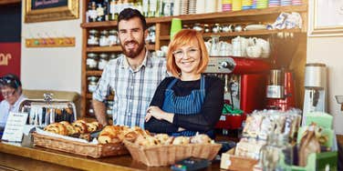bakery owners standing behind counter