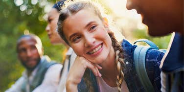 woman with basic good manners having deep conversation with friend