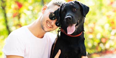 behaviors tell dog owner loves them