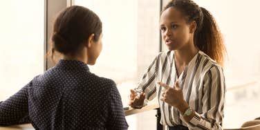 female employee talking to boss