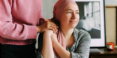 A thoughtful woman navigating a terminal diagnosis; a visual representation of the clarity and life lessons learned when facing limited time.