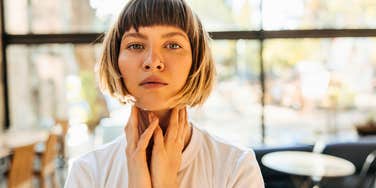 empathic woman looking serious to protect her energy