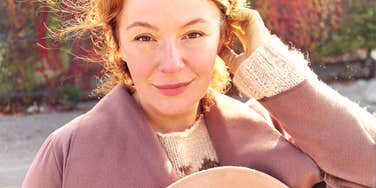 A confident 40-year-old woman looking relieved after letting go of the things that weren't working, capturing the shift from exhaustion to authenticity at age 42.