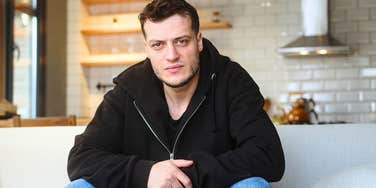 Man who has no friends hiding his loneliness in a nice home 