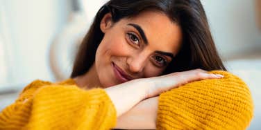 happy introverted woman delighted to be at home