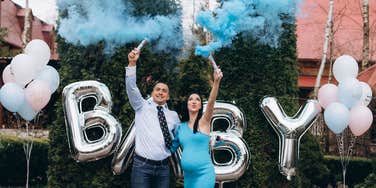parents hosting a huge gender reveal party