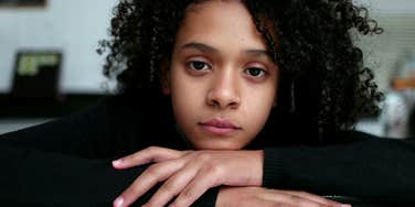 sad teen girl whose mom is forcing her to move out