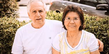 An outdoor portrait of authors elderly parents, representing the high hopes—and the surprising reality—of trying to bridge the distance with aging parents.